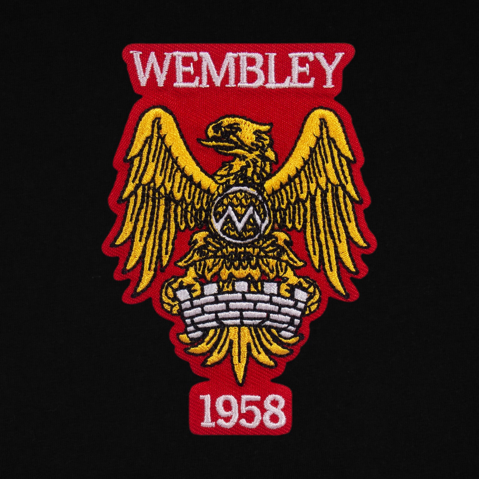 Man Utd adults retro T-shirt in black featuring Manchester and Wembley 58 crest