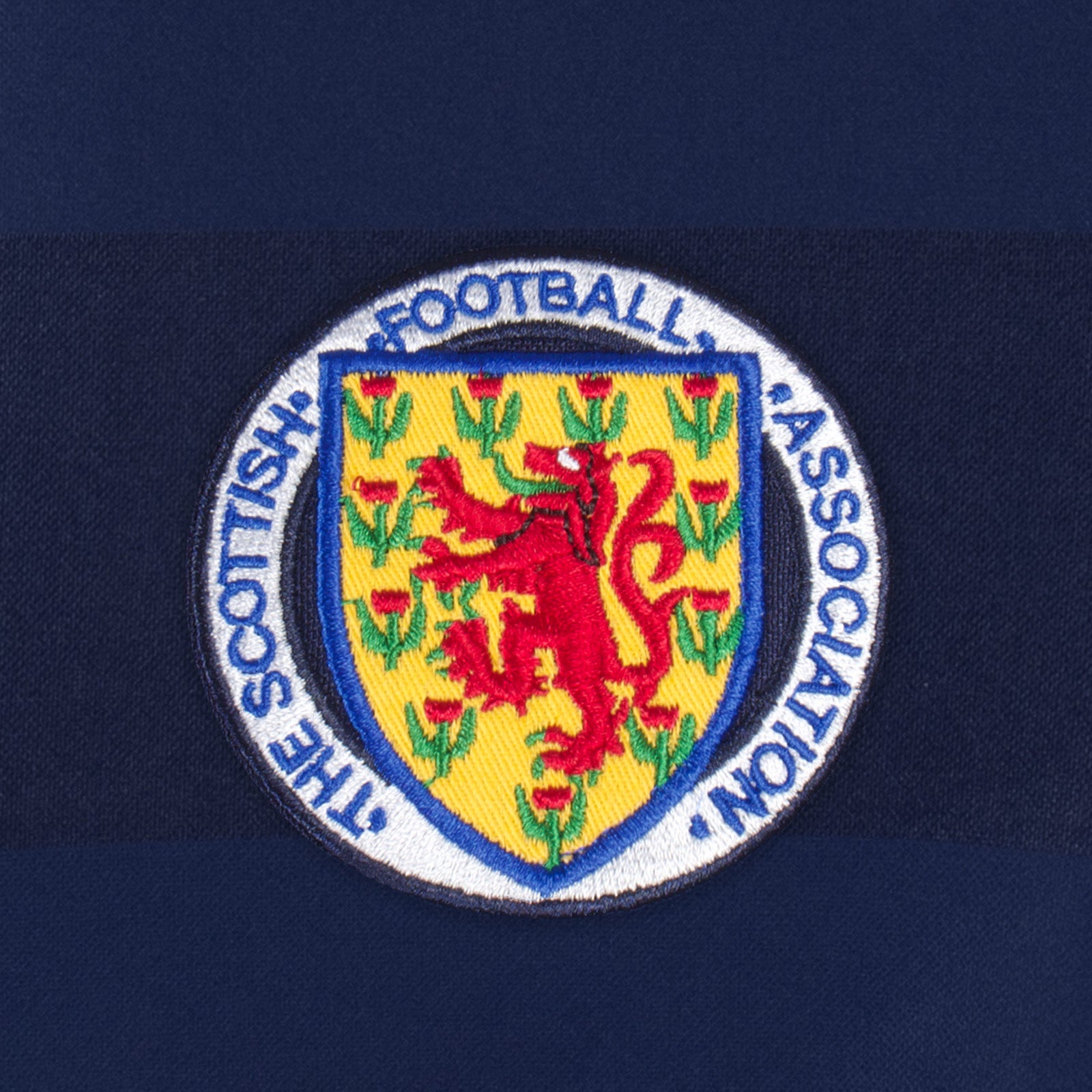 Scotland retro 1986 football shirt. Replica shirt in navy blue with crest to chest