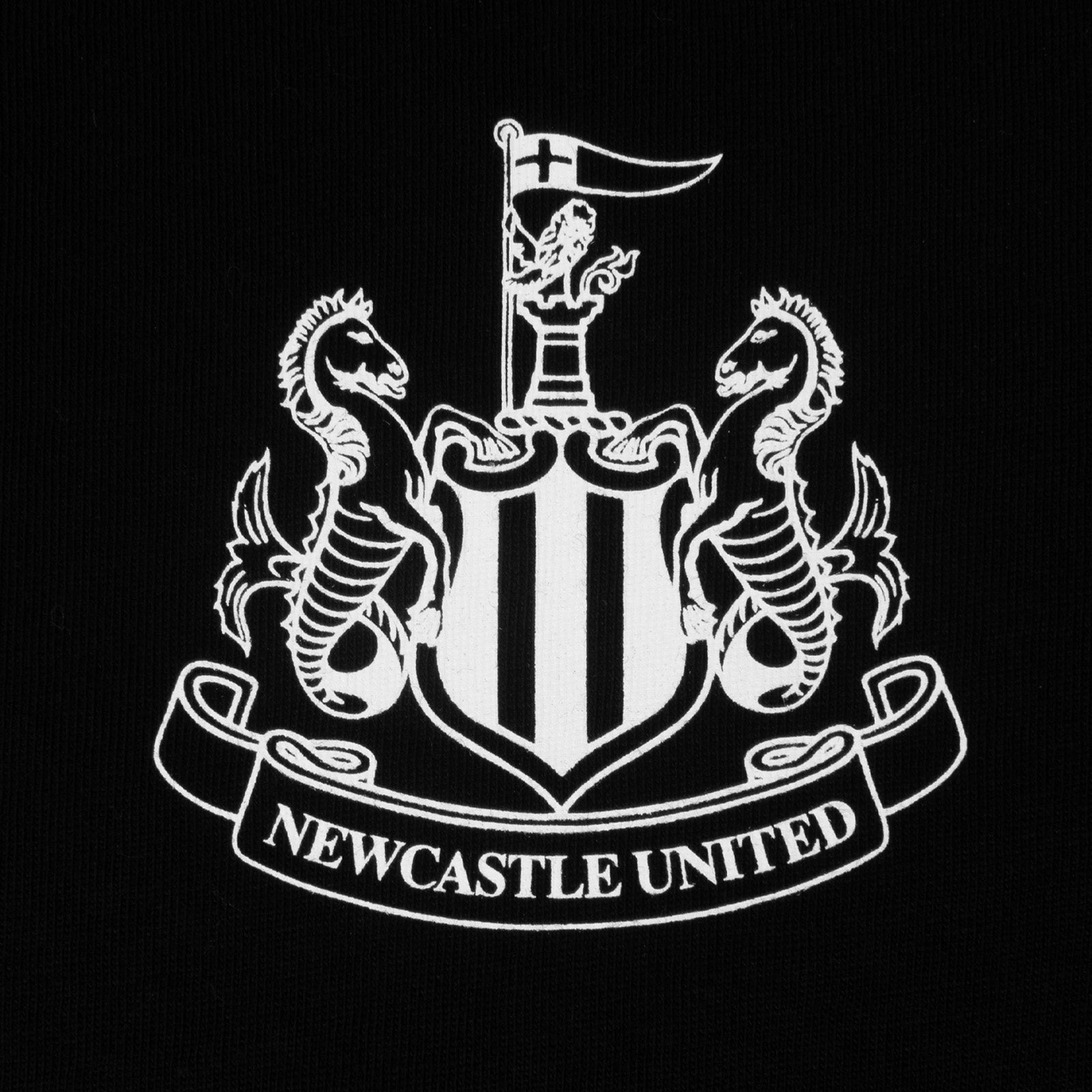Newcastle United adults long pyjamas in black and white. Short sleeve top featuring club crest to chest. Long bottoms with club crest to leg and NEWCASTLE text on the waistband