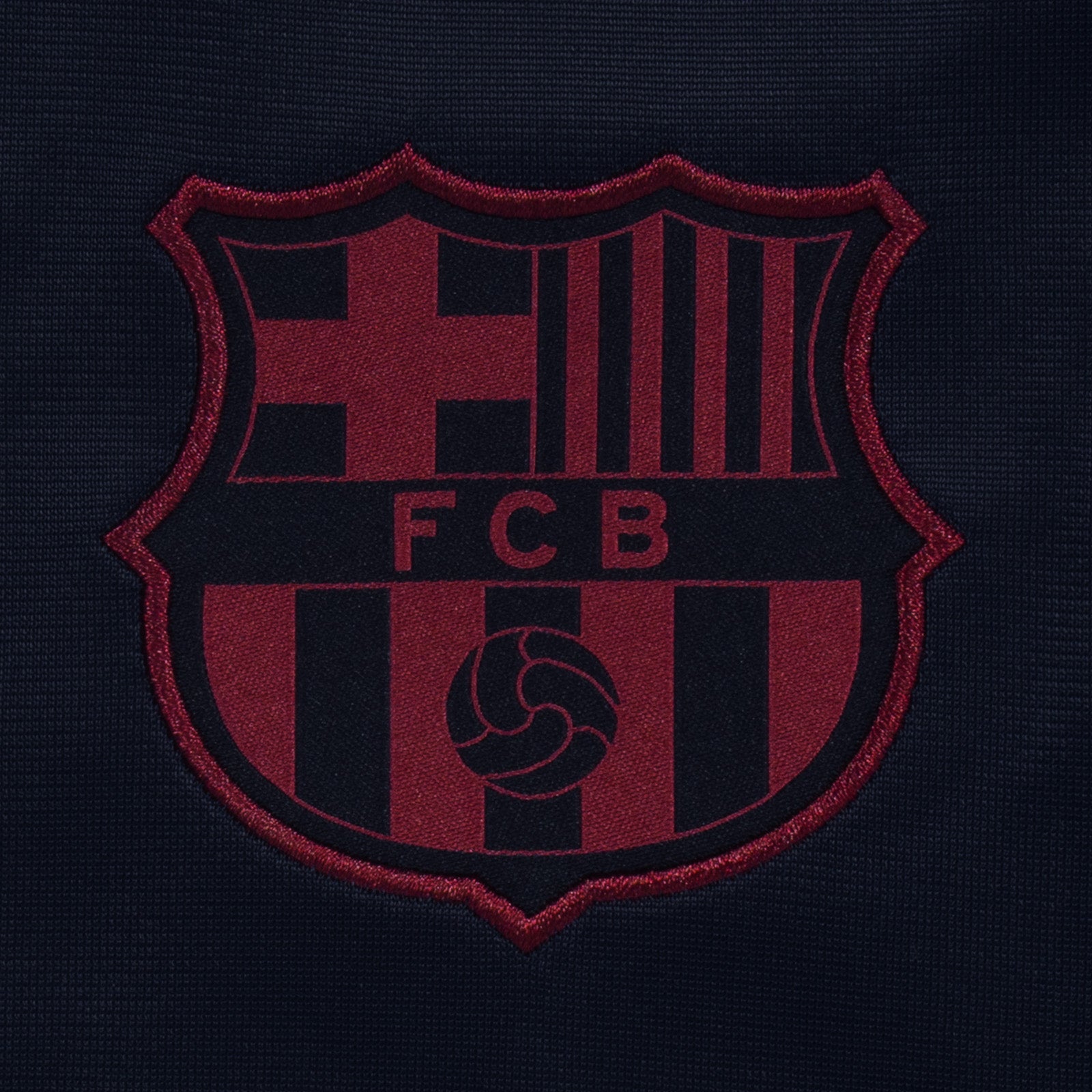 FC Barcelona adults taped tracksuit in navy blue with club crest and text to both top & pants