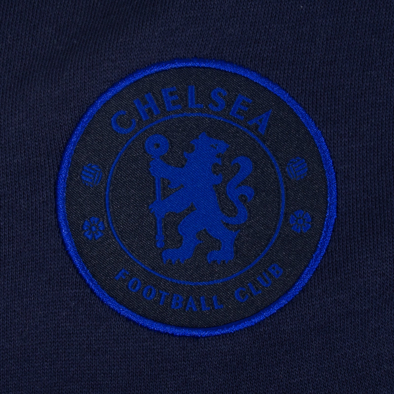 Chelsea adults taped sweatshirt in navy blue with club crest to chest and text to sleeves.