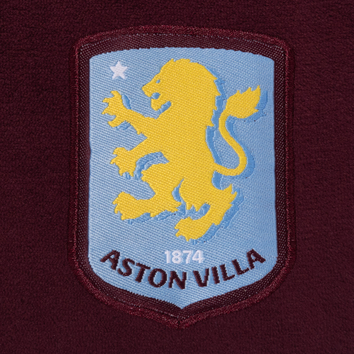 Aston Villa kids hooded dressing gown in claret & blue with club crest on the chest.