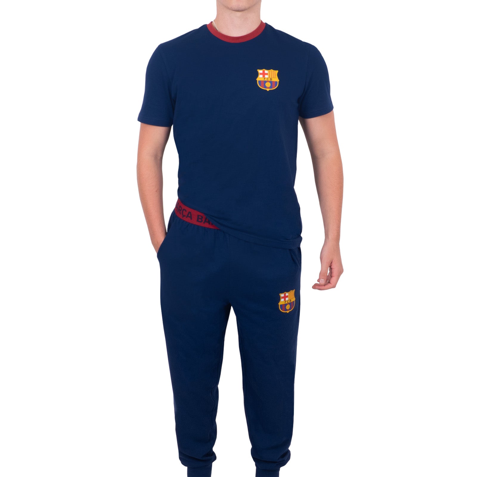 FC Barcelona adults long pyjamas in navy blue. Short sleeve top featuring club crest to chest. Long bottoms with club crest to leg and BARCA text on the waistband