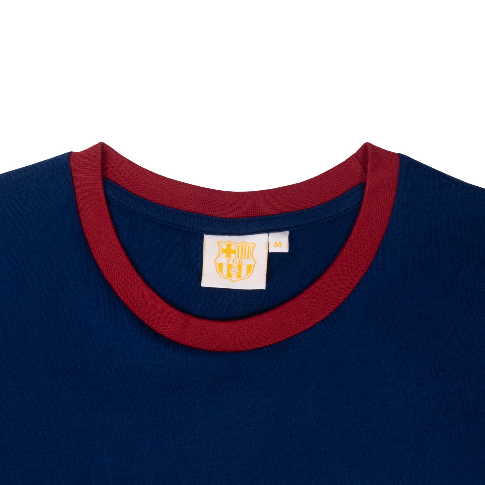 FC Barcelona adults long pyjamas in navy blue. Short sleeve top featuring club crest to chest. Long bottoms with club crest to leg and BARCA text on the waistband