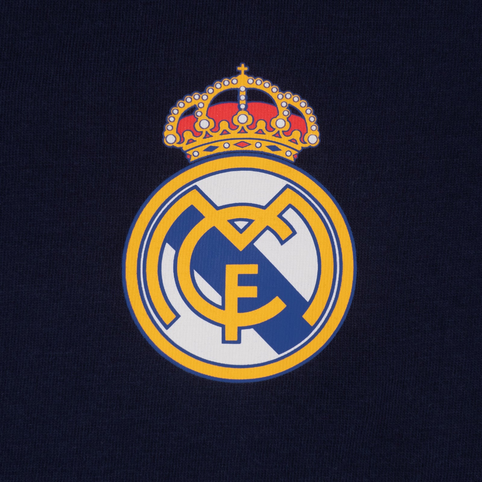 Real Madrid adults long pyjamas in navy blue. Short sleeve top featuring club crest to chest. Long bottoms with club crest to leg and MADRID text on the waistband