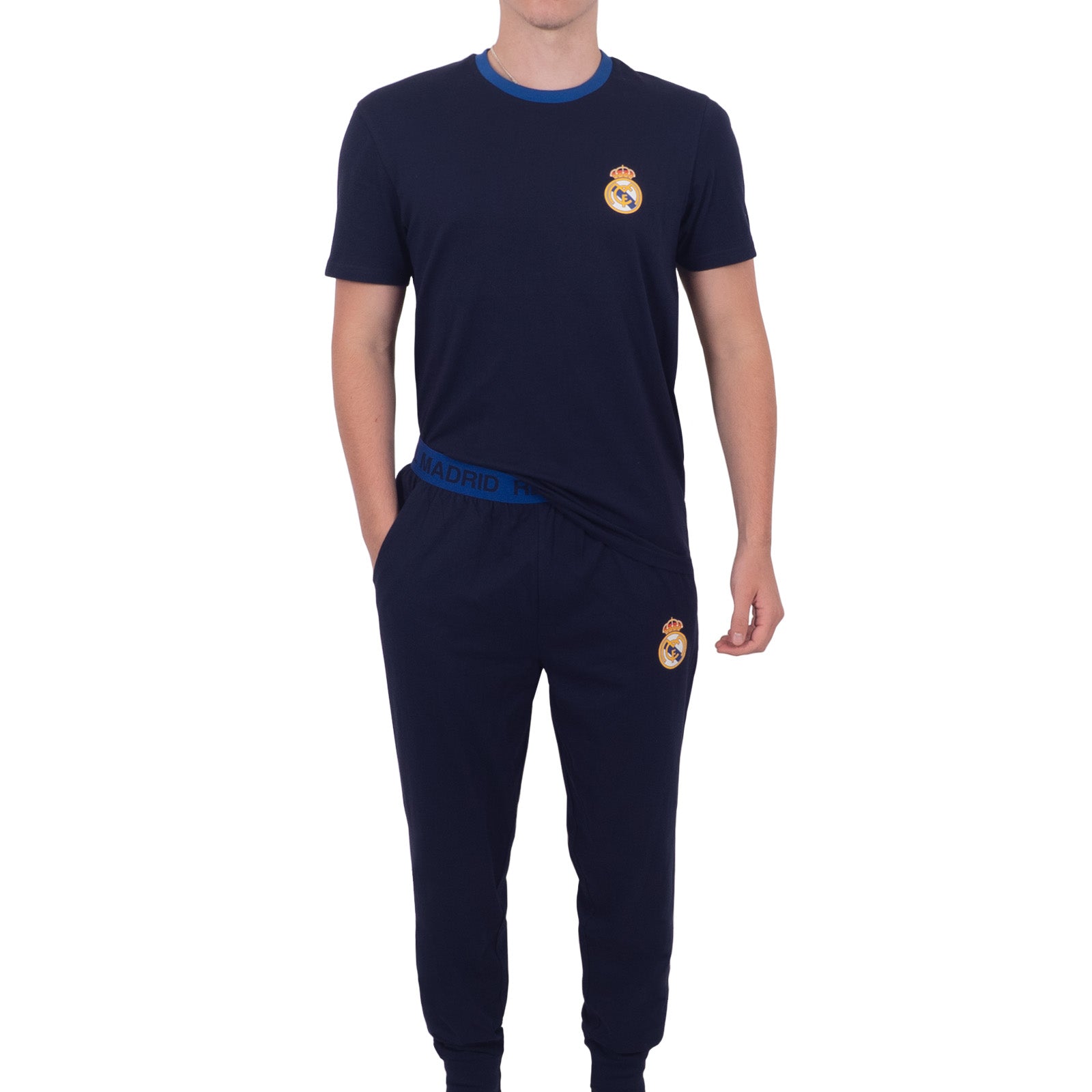 Real Madrid adults long pyjamas in navy blue. Short sleeve top featuring club crest to chest. Long bottoms with club crest to leg and MADRID text on the waistband