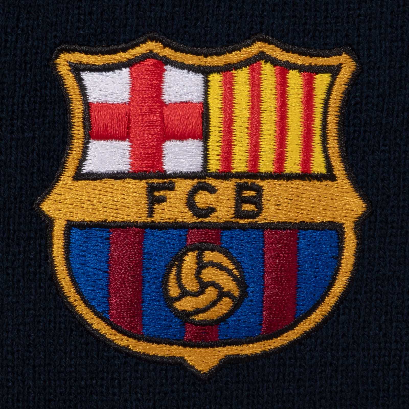 FC Barcelona bobble hat in navy blue with club crest and text to front