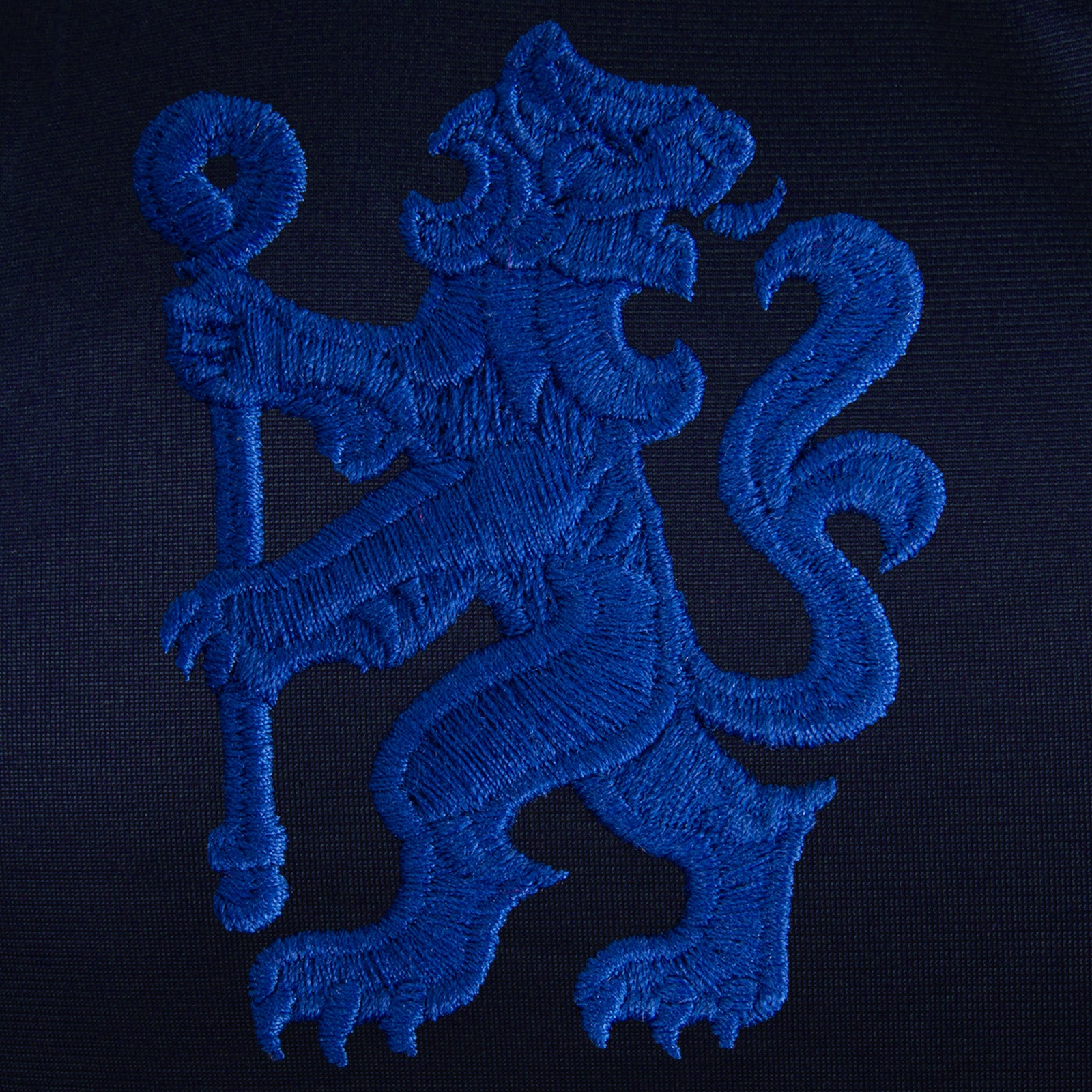 Chelsea adults track jacket in navy blue with retro crest on the chest.