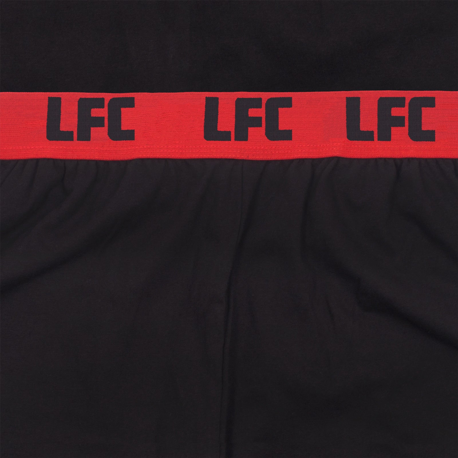 Liverpool adultslong pyjamas in black. Two-tone short sleeve top with club crest and long bottoms with badge