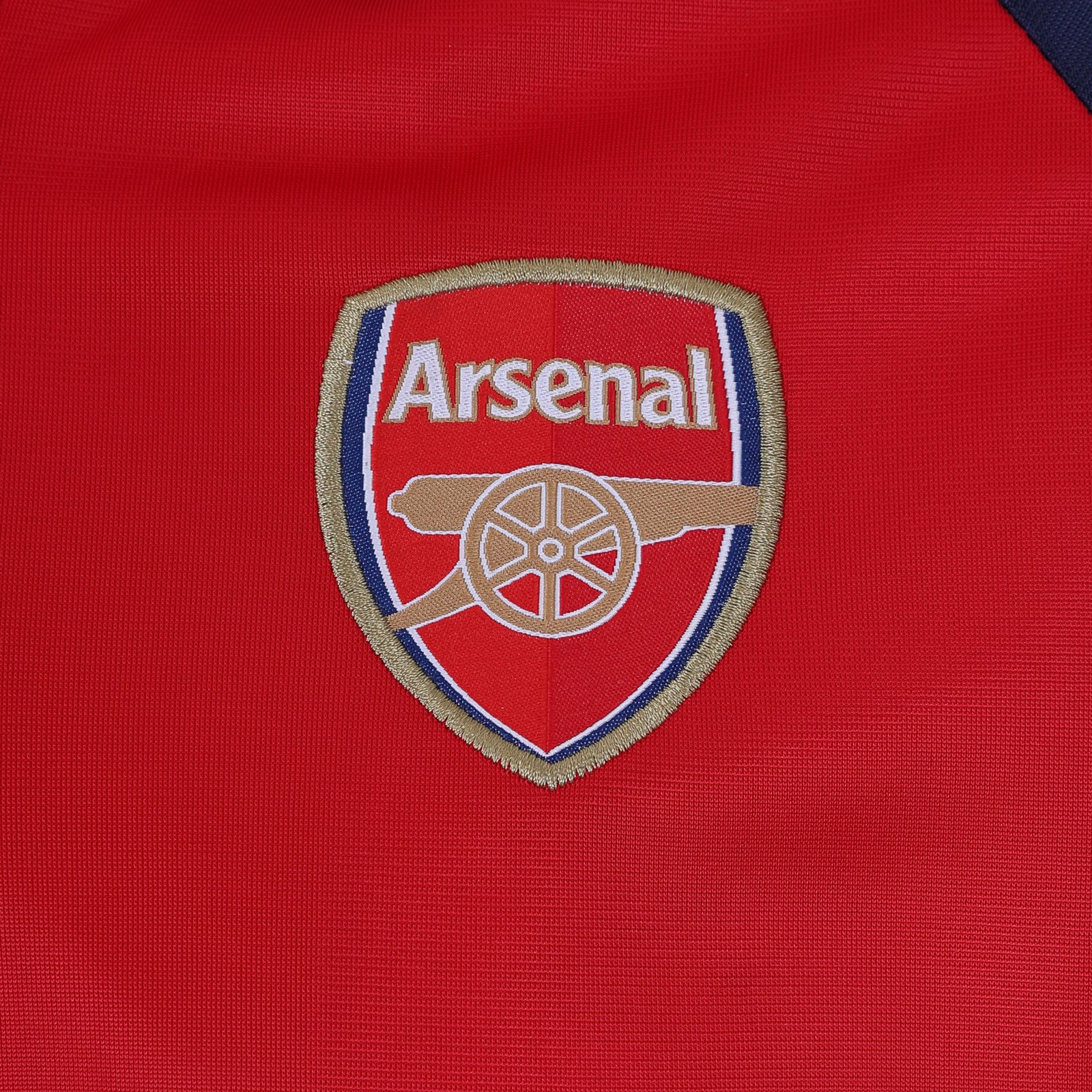 Arsenal adults retro track jacket in red with club crest to chest.