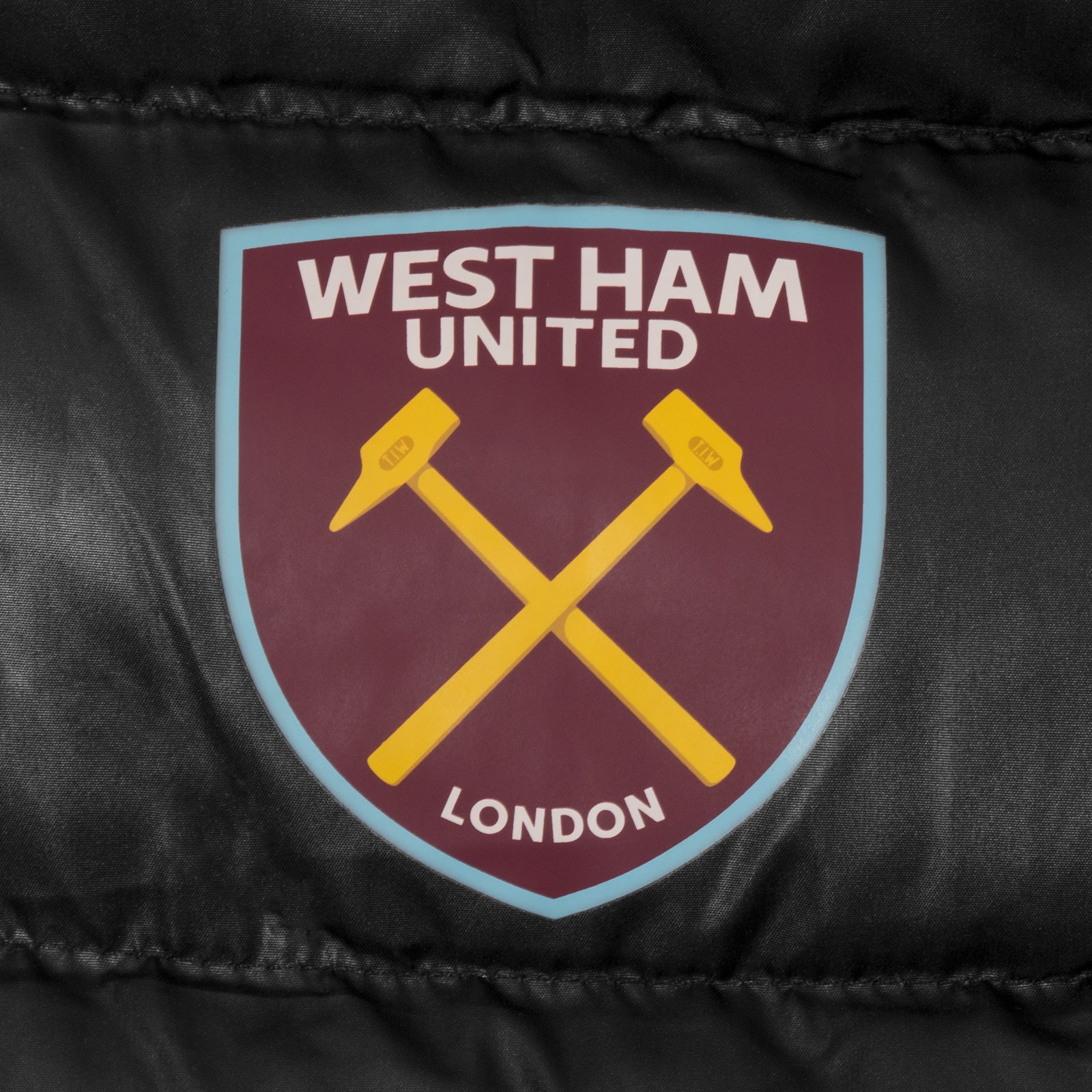 West Ham adults padded gilet in black with full colour club crest to chest.